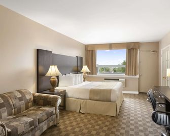 Days Inn & Suites by Wyndham North Bay Downtown - North Bay - Soveværelse
