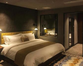 Lijang U Hotel - Lijiang - Schlafzimmer