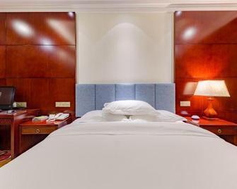 Taoyuan Hotel - Dezhou - Bedroom