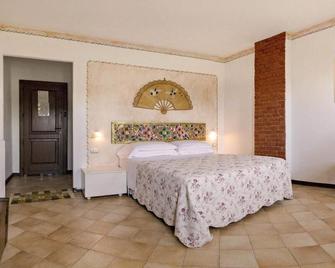 La Carolina - Tigliole - Schlafzimmer