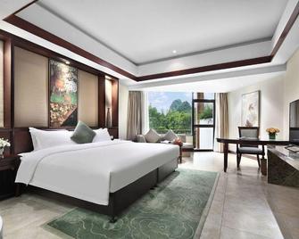 Yangshuo Riverside Resort Hotel - Quế Lâm - Phòng ngủ