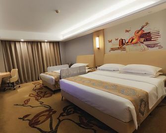 Yigu International Hotel - Xiangyang - Schlafzimmer