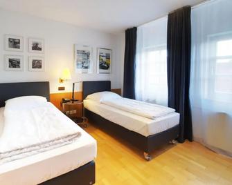 Hotel Reinhardts - Bietigheim-Bissingen - Bedroom
