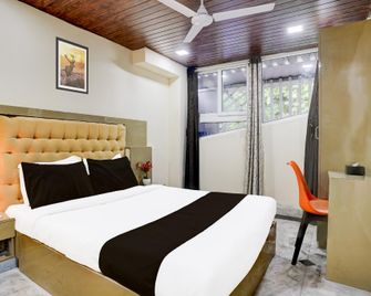 Hotel O earth paradise - Mumbai - Bedroom