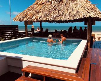 Luxury Beachfront Cabana With Swim Up Pool Bar - Placencia