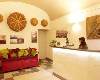 Aghinas - Bosa - Recepción