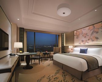 Shangri-La Yangzhou - האנגז'ו - חדר שינה