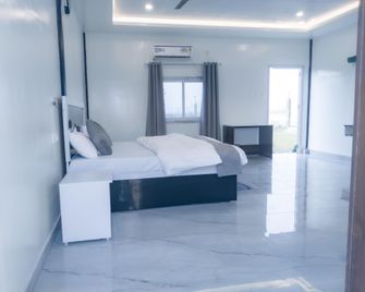 Ganga Bliss - A Riverside Homestay Style Resort In Haridwar - Haridwar - Bedroom