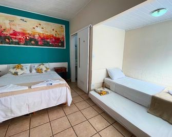 Pousada Vison Ubatuba - Praia Grande - אובטובה - חדר שינה