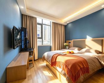 Man Shi Guang Esports Cinema Hotel (You'a International Plaza Branch) - Shaoyang - Bedroom