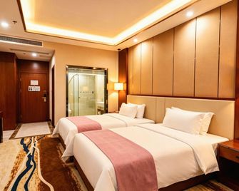 Hexinshi Hotel (Chongqing West Railway Station) - Chongqing - Bedroom