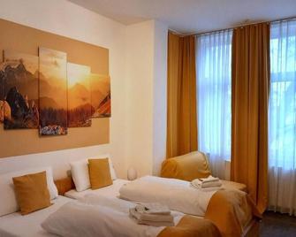 هوتل كارولينجر - دوسيلدورف - غرفة نوم