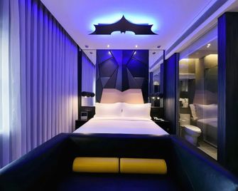 Orange Hotel (Beijing Tongzhou Universal Resort Branch) - Beijing - Bedroom