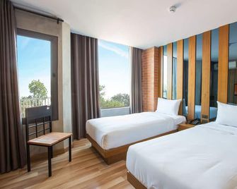 B2 Udon Boutique & Budget Hotel - Удон Тані - Спальня