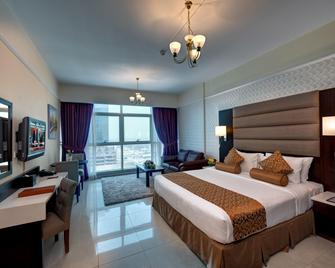 Emirates Grand Hotel Apartments - דובאי - חדר שינה