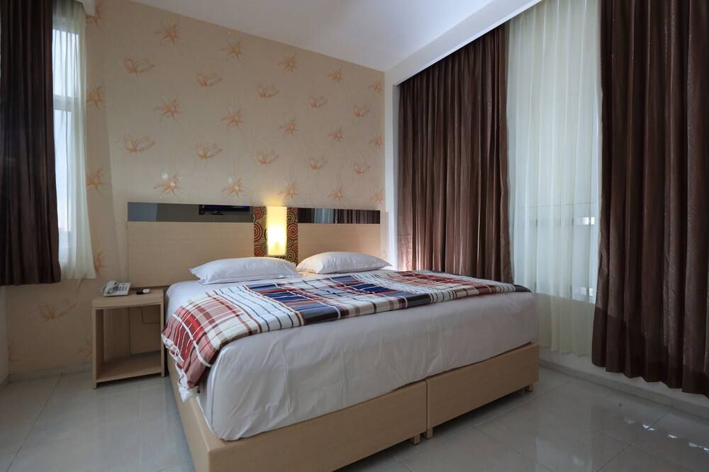 Hotel Dewarna Sutoyo Malang - מאלאנג - חדר שינה