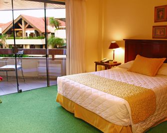 Yotau All Suites Hotel - Santa Cruz - Makuuhuone