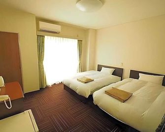 Business Hotel Urbanty Nishikujo - Osaka - Kamar Tidur