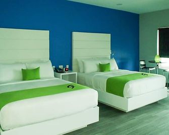 Garland Hotel - New Concord - Bedroom