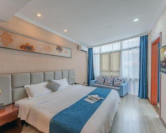 Yihaige Culture Hotel (Xiamen Zhongshan Pedestrian Street) - Xiamen - Bedroom
