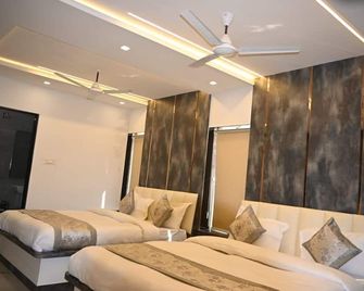 Ramlala Hotel - Faizābād - Habitación