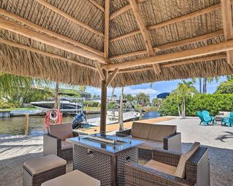 Palm City Canalfront Home with Tiki Hut and Dock! - Palm City - Patio