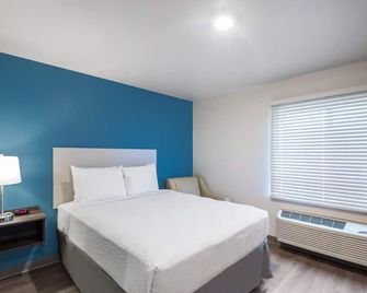 Woodspring Suites Evansville East - אבנסוויל - חדר שינה