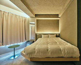 Hotel Uro - Nagasaki - Schlafzimmer