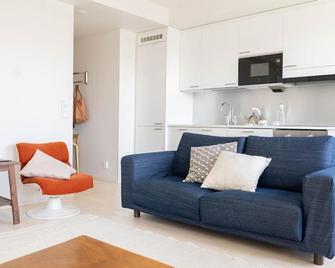 Stylish new 1br apt in Aurinkolahti - הלסינקי - סלון