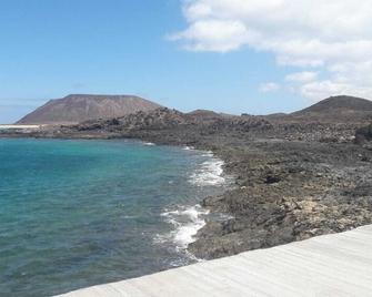 Sun Beach, bungalow for 2-4 people with swimming pool in Caleta de Fuste, Fuerteventura - Antigua - Beach