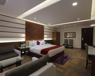 Hotel The Lotus Park - Ahmedabad - Bedroom