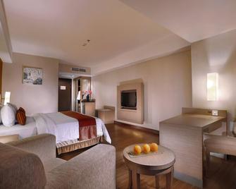 Grand Aston City Hall Hotel & Serviced Residences - Medan - Bedroom