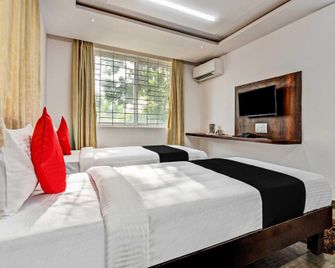 Collection O 73565 J J Global Exotics Stays - Bangalore - Slaapkamer