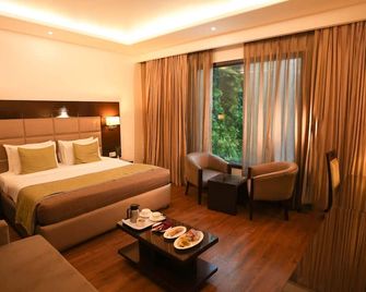 هوتل أفريكا أفينيو جي كيه 1 - نيو دلهي - غرفة نوم