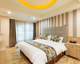 Ouyamei Xinye International Hotel - שנחאי - חדר שינה