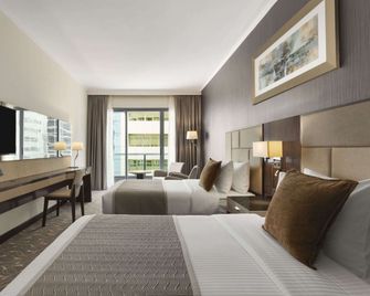 Hawthorn Suites by Wyndham Abu Dhabi City Center - Abu Dabi - Habitación