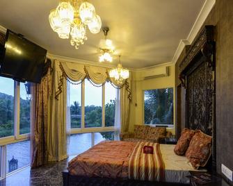 Oyo 850 Hotel River Palace - Siolim - Bedroom