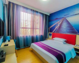 Pai Hotel Jiuquan Gulou Jianshe Road - Jiuquan - Bedroom