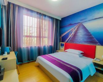 Pai Hotel Jiuquan Gulou Jianshe Road - Jiuquan - Slaapkamer