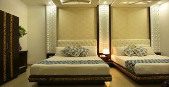 Hotel Riya Palace - Agra - Schlafzimmer