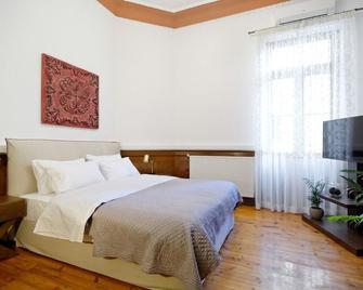 The Athens History - Atenas - Habitación