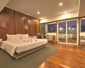 هوتل سوماديفي أنجكور بوتيك آند ريزورت - سيم ريب - غرفة نوم