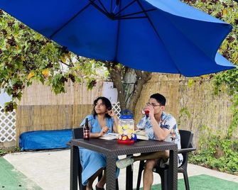 Discover Guayama's Tropical Treasure: Your Home Away From Home. - Guayama - Patio