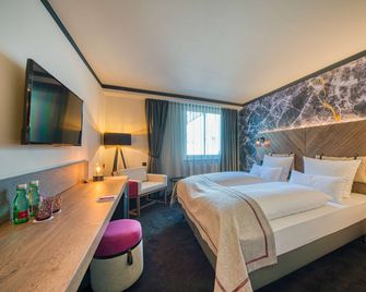FourSide Hotel Salzburg, Trademark Collection by Wyndham - Salzburg - Soveværelse