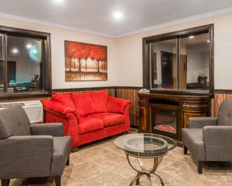 Super 8 by Wyndham Bedford - Bedford - Sala de estar