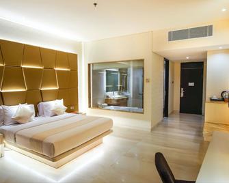 Fm7 Resort Hotel - Jakarta Airport - Tangerang City - Schlafzimmer