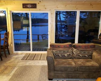 Lakefront Getaways - 185' all sand beach - Snowmobile trail access - Harshaw - Living room