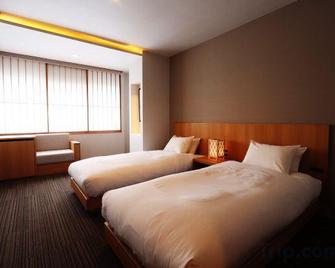Fukutokuya Ryokan - Unzen - Bedroom