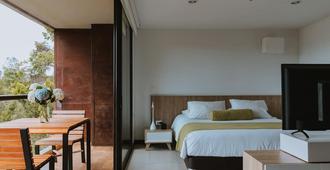 Travelers Rio Verde Living Suites - Rionegro - Camera da letto
