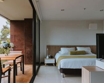 Travelers Rio Verde Living Suites - Rionegro - Camera da letto